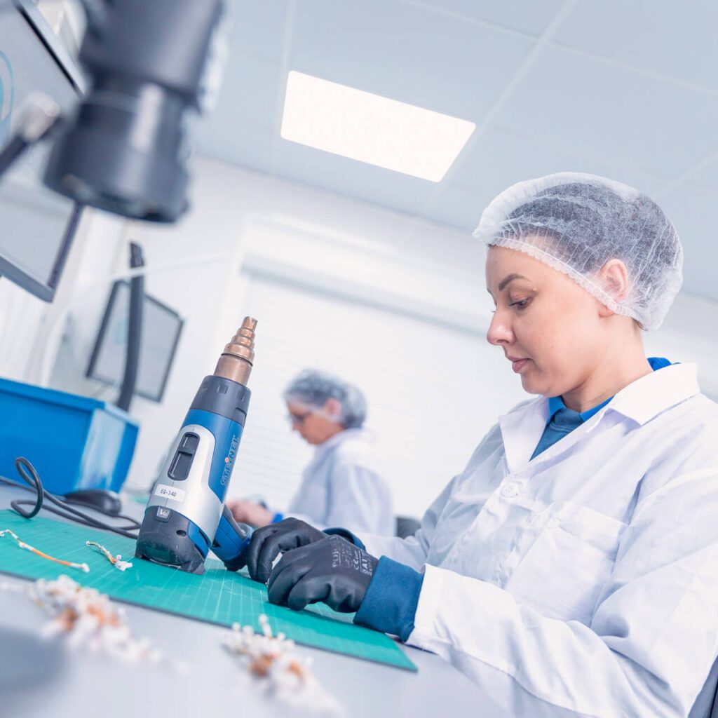 photo of a woman manufacturing cables at Cablepoint cable manufacturers